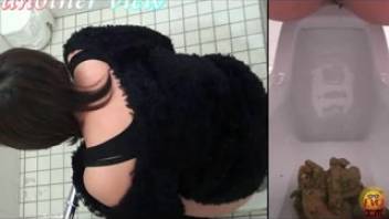 Girl defecating in a Japanese bathroom 3